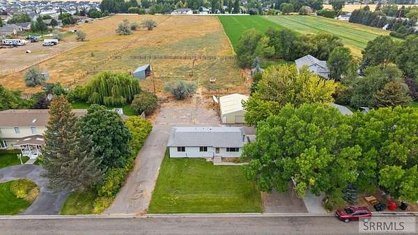5.55 Acres of Residential Land with Home for Sale in Rigby, Idaho