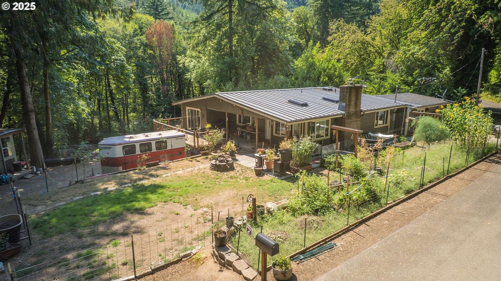 5 Acres of Land with Home for Sale in Swisshome, Oregon