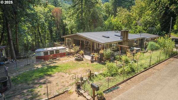 5 Acres of Land with Home for Sale in Swisshome, Oregon