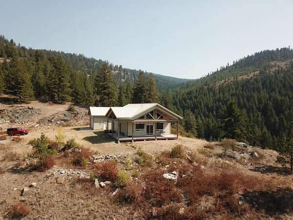 80 Acres of Recreational Land with Home for Sale in Curlew, Washington