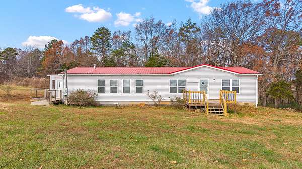 9.37 Acres of Land with Home for Sale in Sweetwater, Tennessee