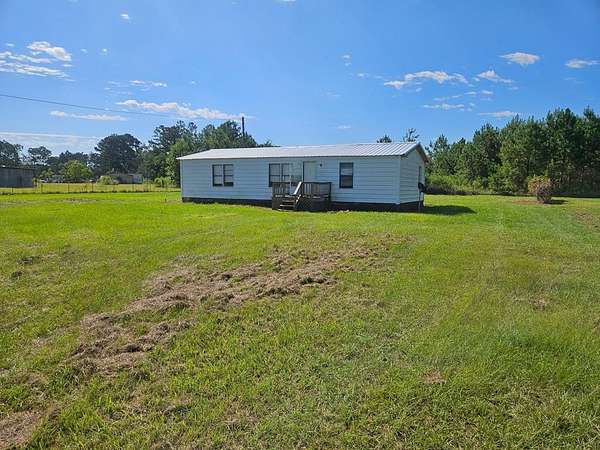 2 Acres of Residential Land with Home for Sale in Nashville, Georgia