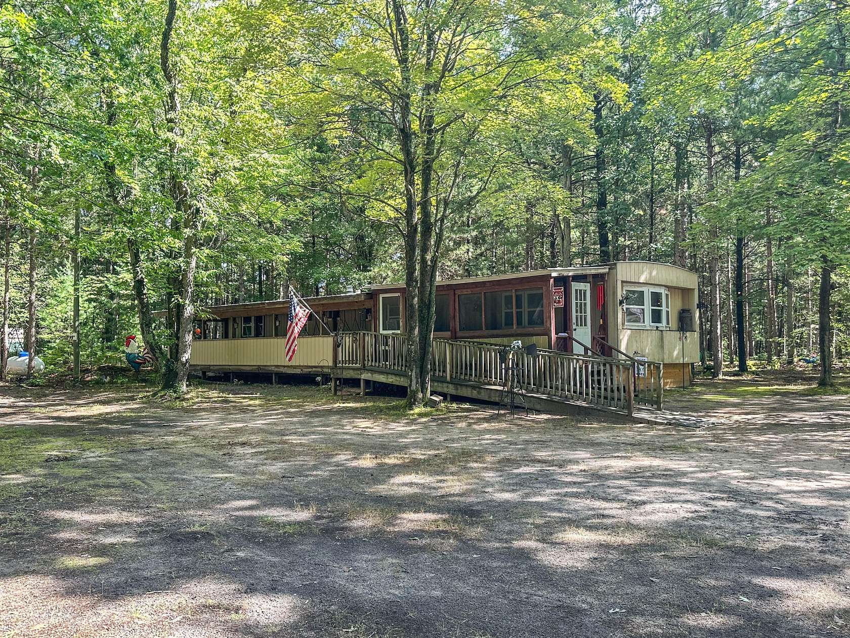 10 Acres of Recreational Land with Home for Sale in Free Soil, Michigan