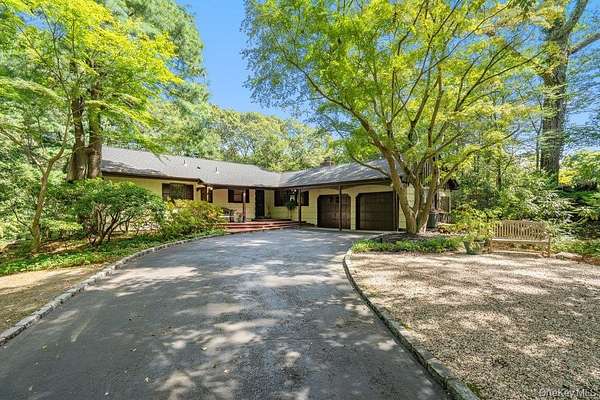 1.6 Acres of Residential Land with Home for Sale in Dix Hills, New York