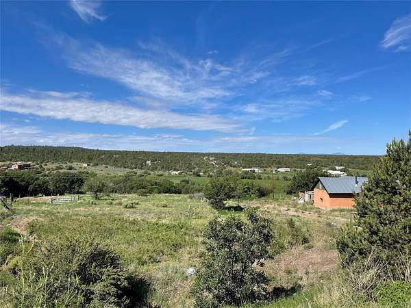 10.4 Acres of Land with Home for Sale in Ojo Sarco, New Mexico