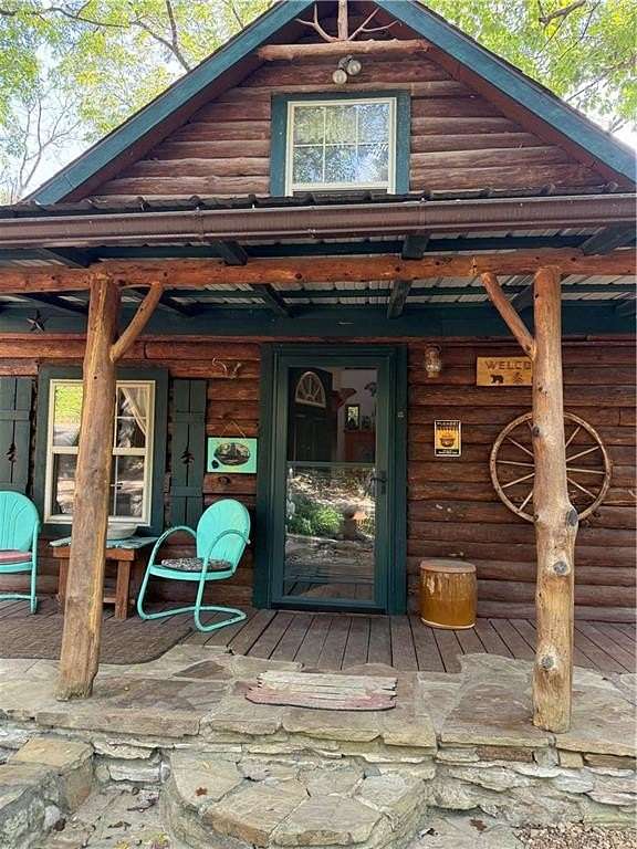 5.1 Acres of Residential Land with Home for Sale in Berryville, Arkansas