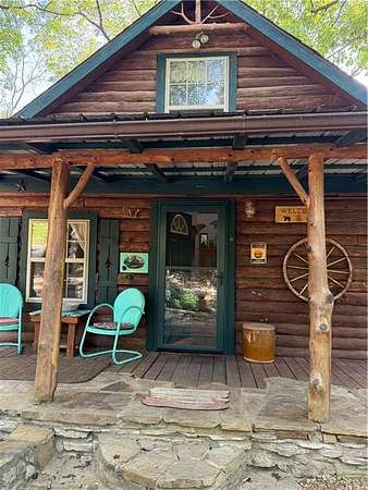 5.1 Acres of Residential Land with Home for Sale in Berryville, Arkansas