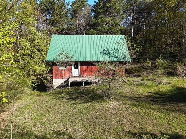 5 Acres of Land with Home for Sale in Frankfort, Michigan