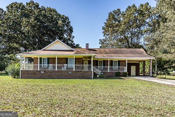 2 Acres of Residential Land with Home for Sale in Silver Creek, Georgia