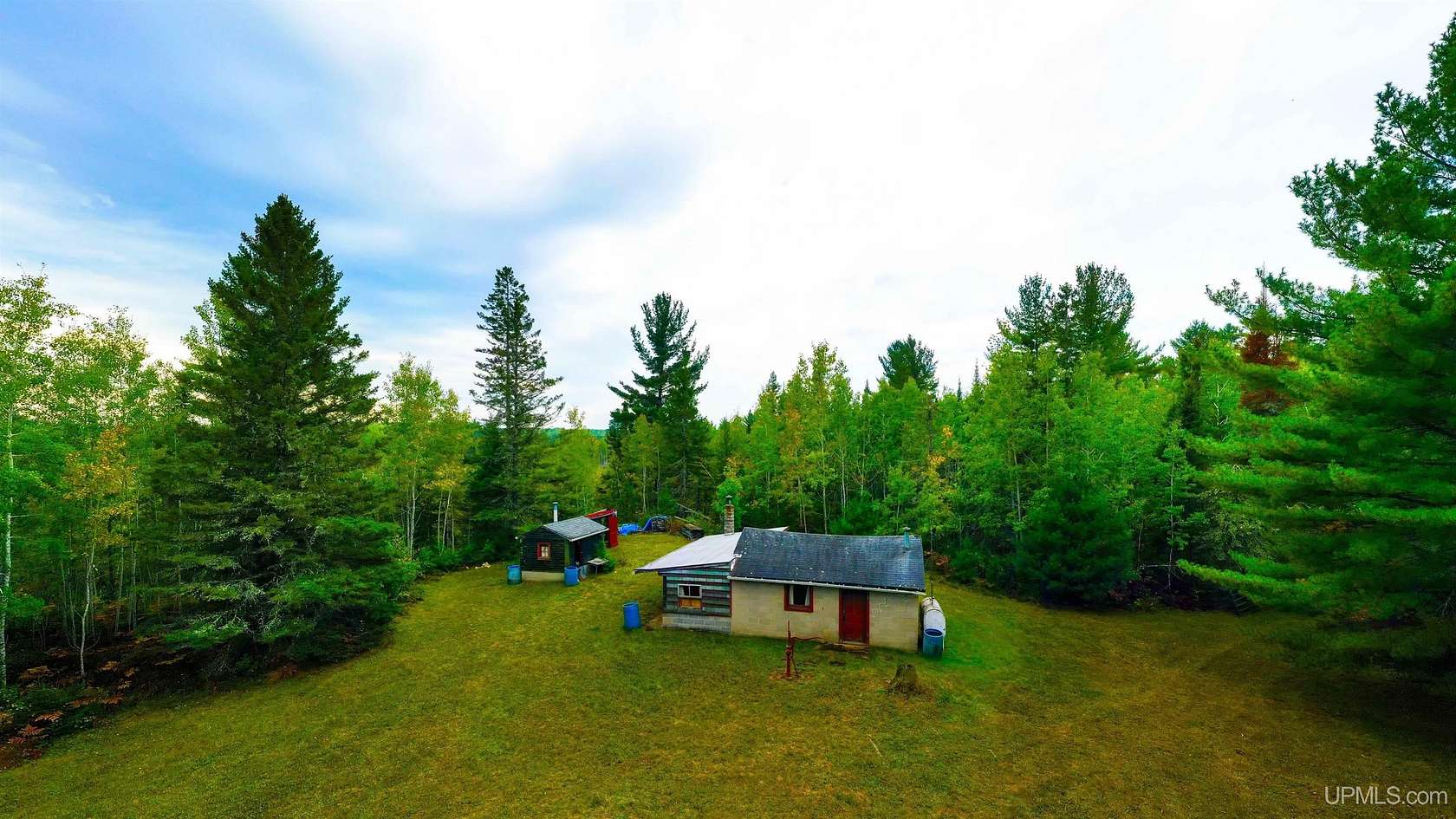 100 Acres of Recreational Land with Home for Sale in Perronville, Michigan