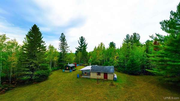 100 Acres of Recreational Land with Home for Sale in Perronville, Michigan