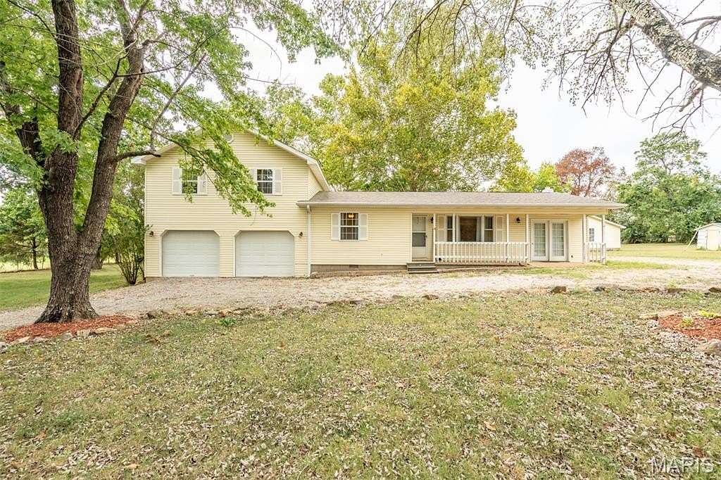 1.89 Acres of Residential Land with Home for Sale in Poplar Bluff, Missouri