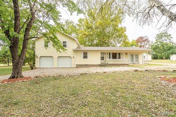 1.89 Acres of Residential Land with Home for Sale in Poplar Bluff, Missouri