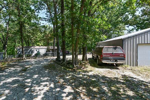 4.2 Acres of Residential Land with Home for Sale in Roach, Missouri