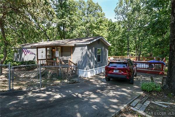 4.2 Acres of Land with Home for Sale in Roach, Missouri