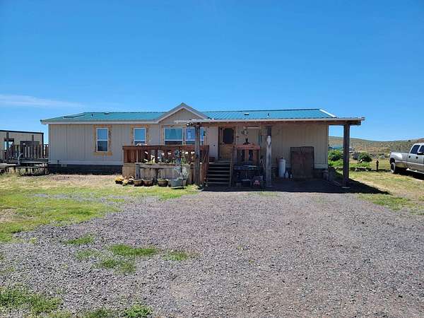 6.6 Acres of Land with Home for Sale in Hines, Oregon