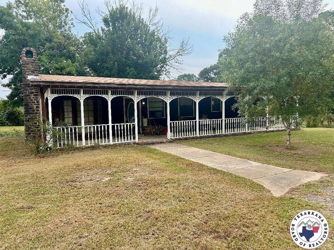 26.2 Acres of Land with Home for Sale in Atlanta, Texas