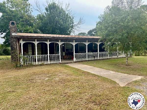 26.2 Acres of Land with Home for Sale in Atlanta, Texas