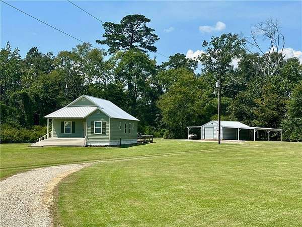 3 Acres of Residential Land with Home for Sale in Albany, Louisiana