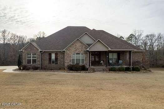 1.8 Acres of Residential Land with Home for Sale in Henderson, Tennessee