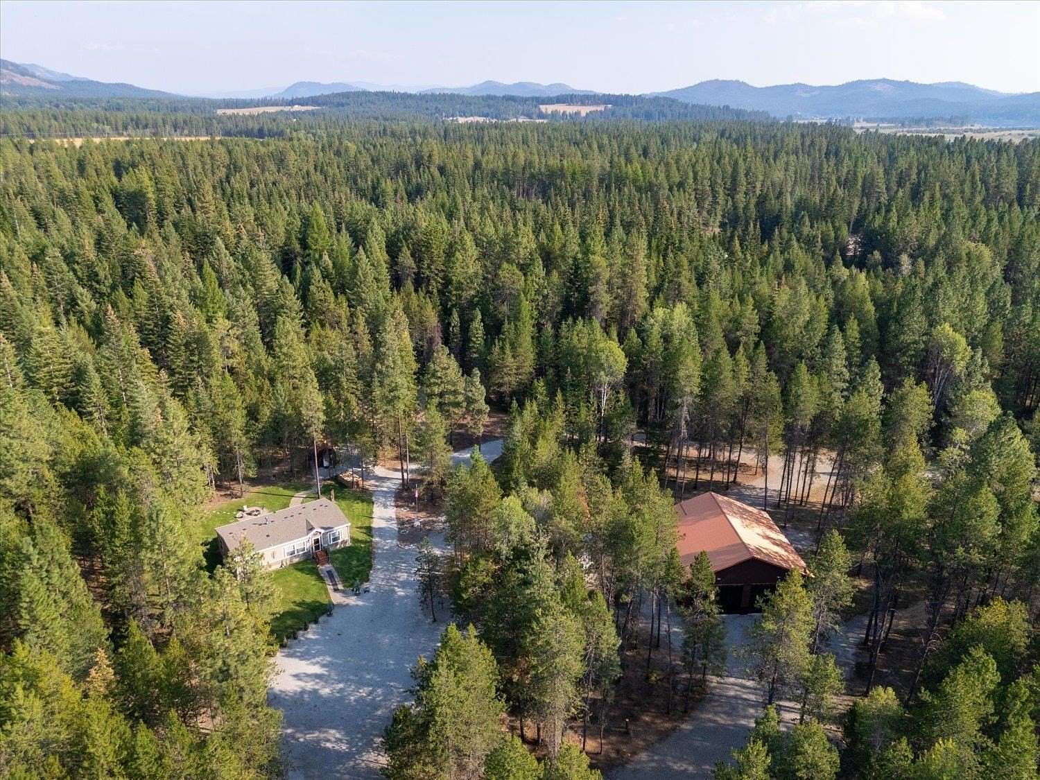 8.77 Acres of Residential Land with Home for Sale in Usk, Washington