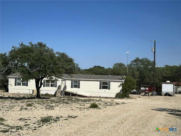 10 Acres of Land with Home for Sale in Kempner, Texas
