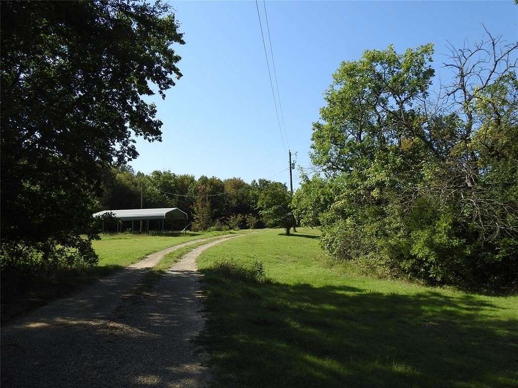 7 Acres of Residential Land with Home for Sale in Dodd City, Texas