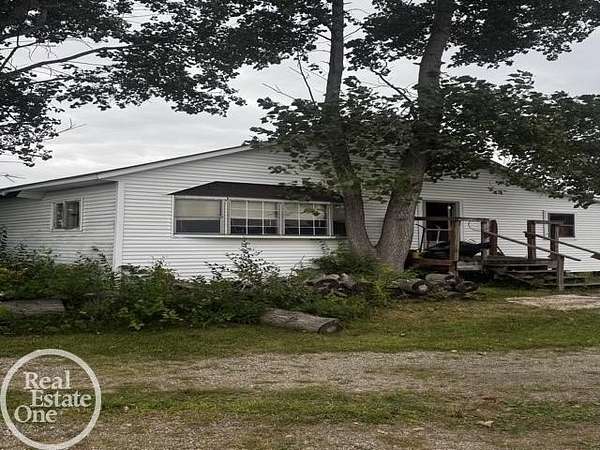 10 Acres of Land with Home for Sale in Greenwood Township, Michigan