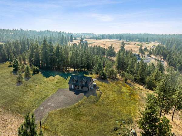 9.3 Acres of Residential Land with Home for Sale in Spokane, Washington