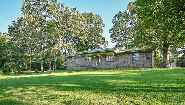 5.4 Acres of Residential Land with Home for Sale in Mena, Arkansas