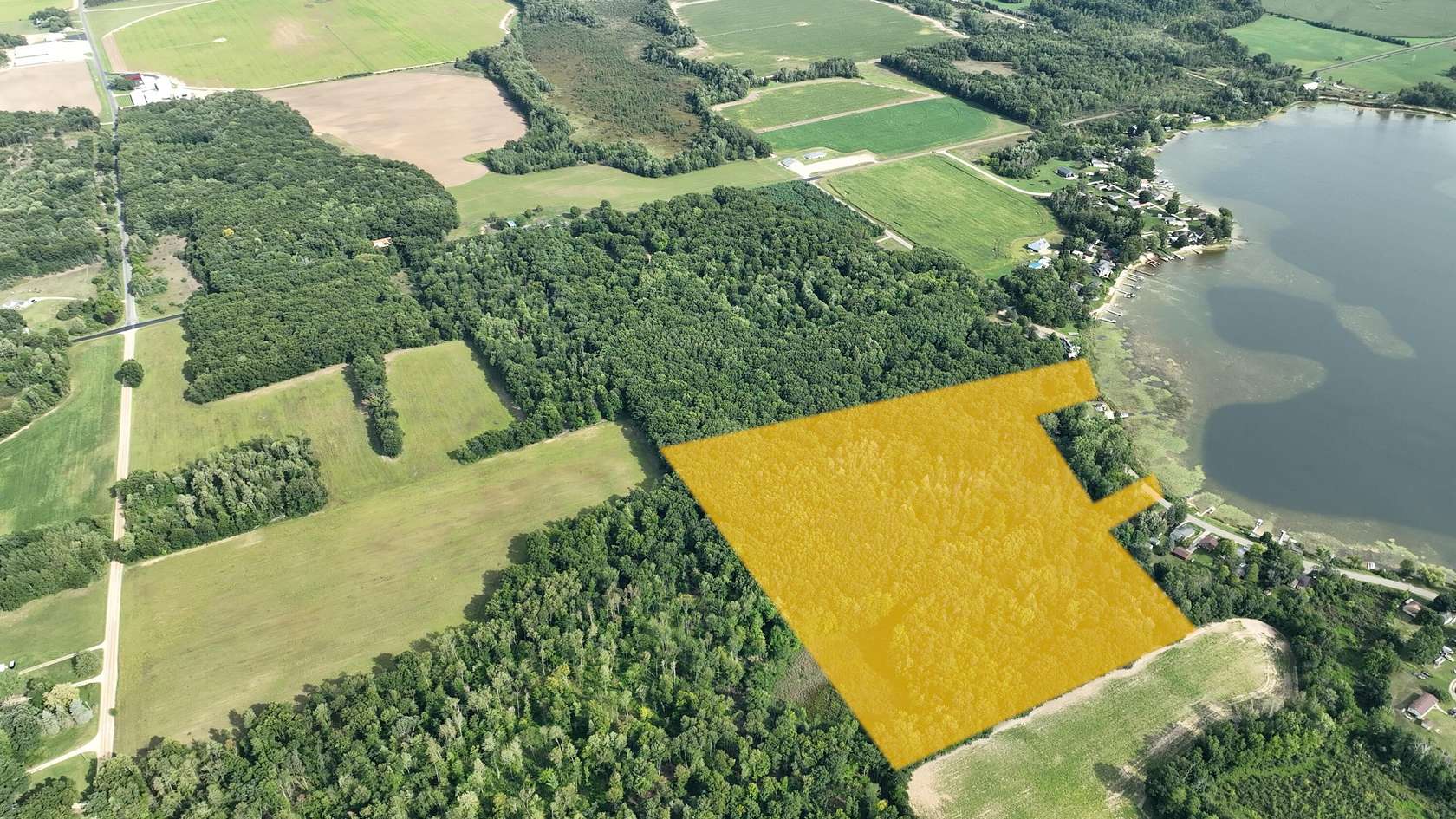 30 Acres of Recreational Land with Home for Sale in Howard City, Michigan