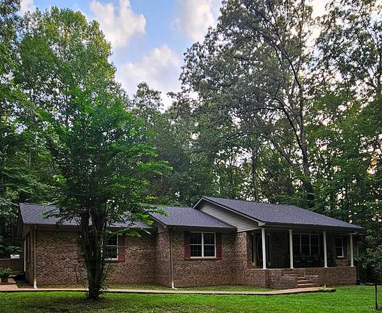 11.2 Acres of Land with Home for Sale in Springville, Tennessee