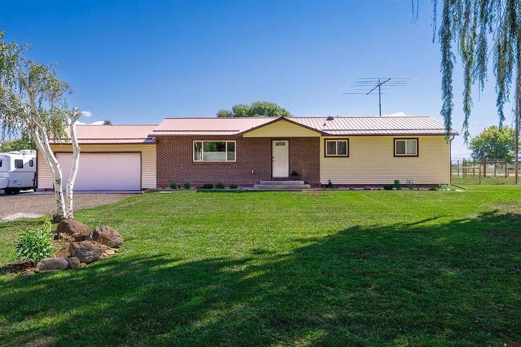 3 Acres of Residential Land with Home for Sale in Montrose, Colorado