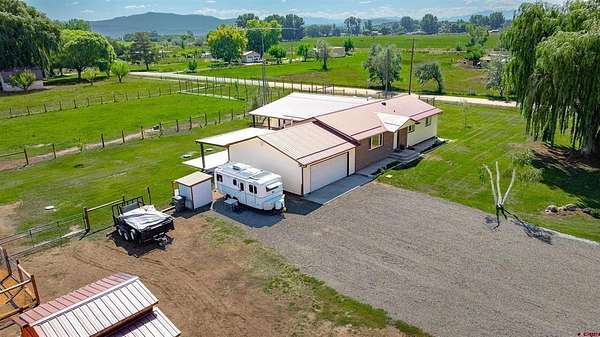 3 Acres of Land with Home for Sale in Montrose, Colorado