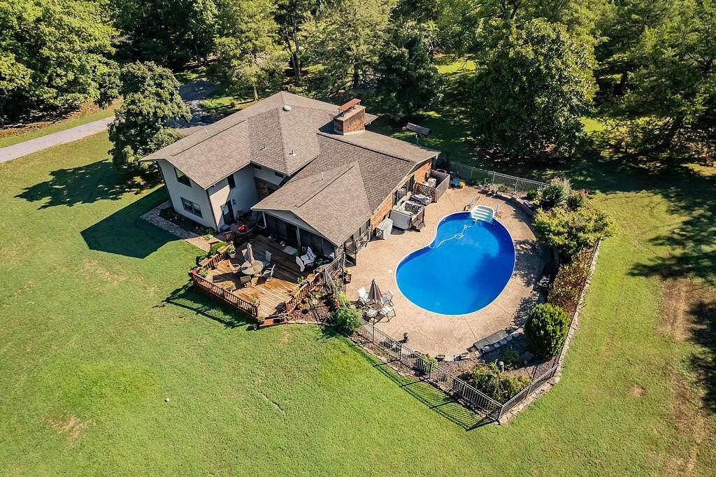 3.77 Acres of Land with Home for Sale in Hollister, Missouri