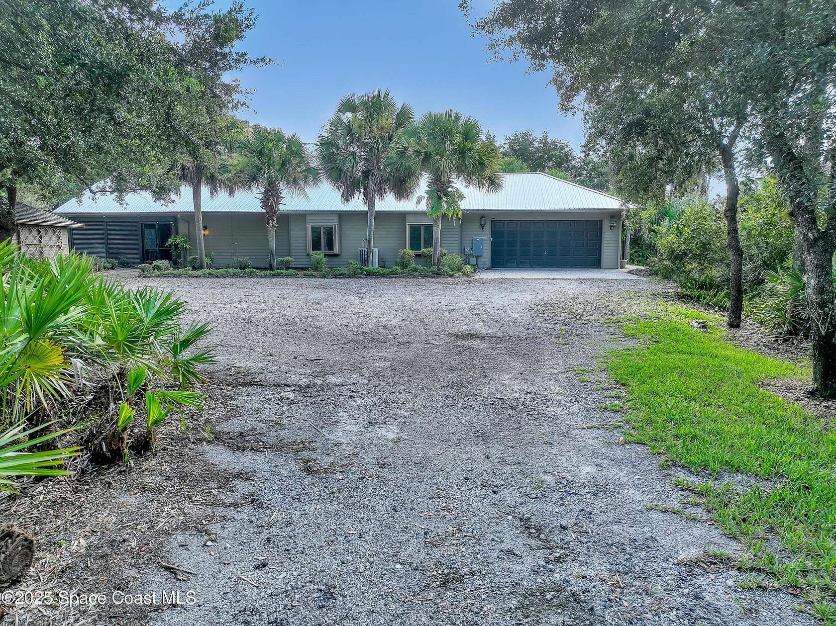 2.52 Acres of Residential Land with Home for Sale in Okeechobee, Florida