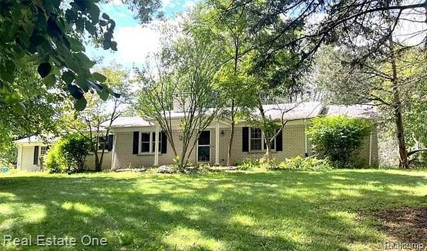 2 Acres of Residential Land with Home for Sale in Oakland Charter Township, Michigan