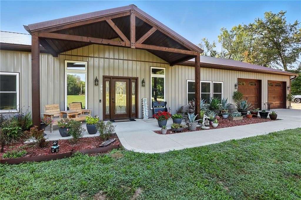 5.5 Acres of Residential Land with Home for Sale in Smithville, Missouri