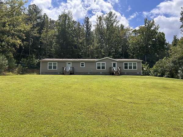 100 Acres of Recreational Land with Home for Sale in Lyles, Tennessee