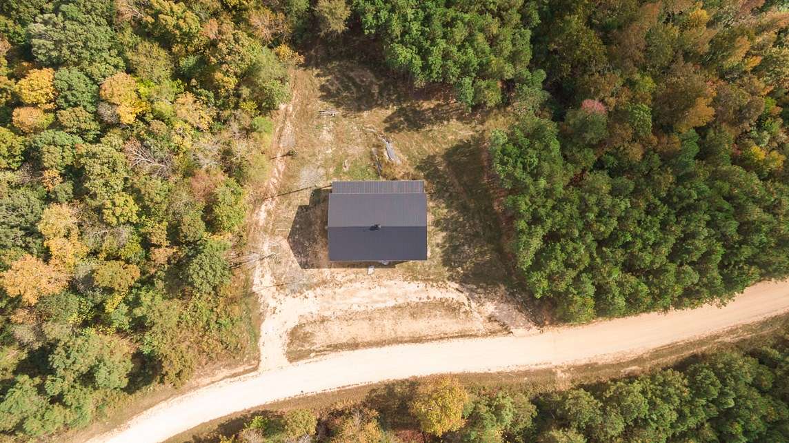 24.5 Acres of Recreational Land with Home for Sale in Parsons, Tennessee