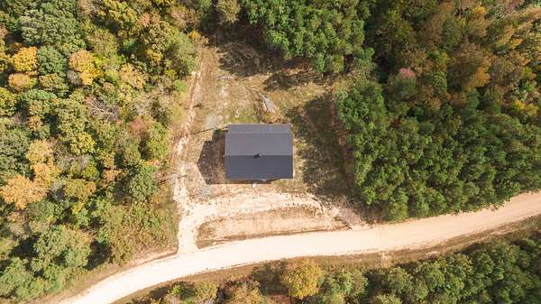 24.5 Acres of Recreational Land with Home for Sale in Parsons, Tennessee