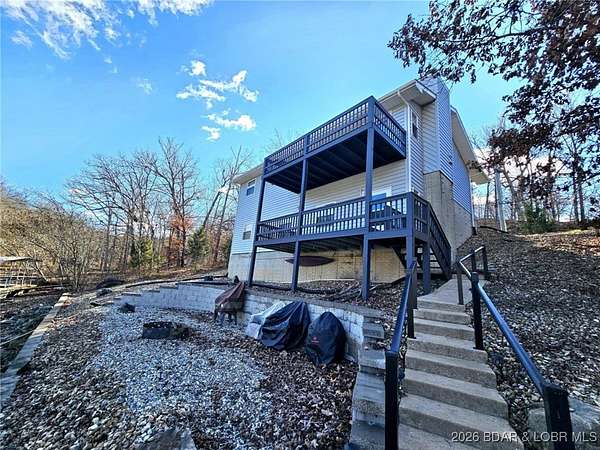 2 Acres of Residential Land with Home for Sale in Gravois Mills, Missouri