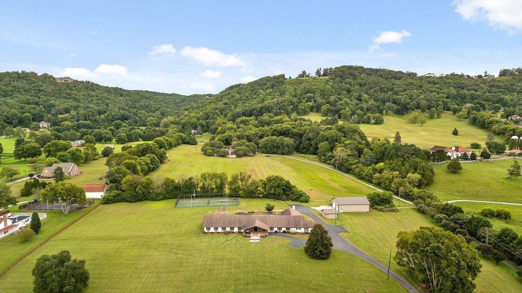 9 Acres of Residential Land with Home for Sale in Ooltewah, Tennessee