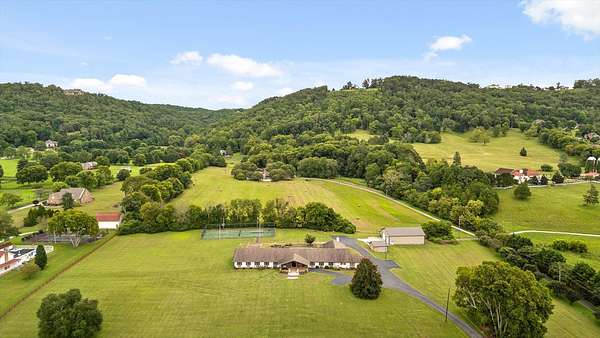9 Acres of Residential Land with Home for Sale in Ooltewah, Tennessee