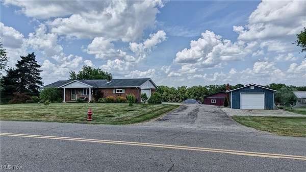 4.7 Acres of Residential Land with Home for Auction in Dundee, Ohio