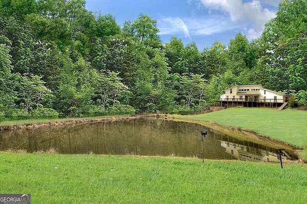 6.52 Acres of Residential Land with Home for Sale in Ellijay, Georgia