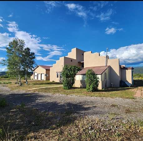 4.33 Acres of Land with Home for Sale in Tierra Amarilla, New Mexico