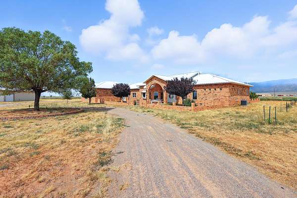10.7 Acres of Land with Home for Sale in Belen, New Mexico