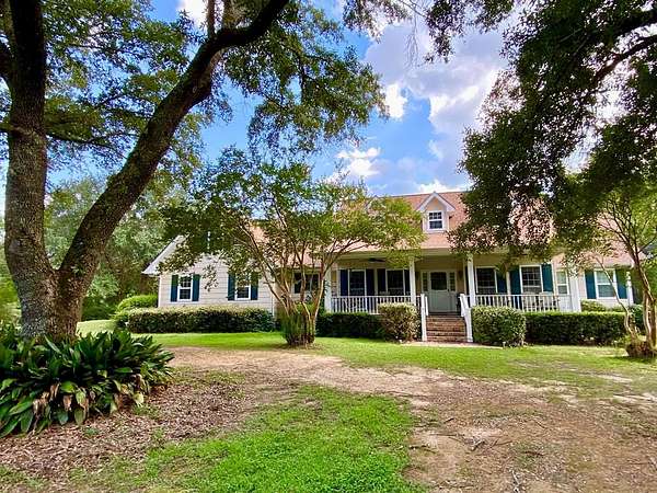 57.4 Acres of Land with Home for Sale in Carriere, Mississippi