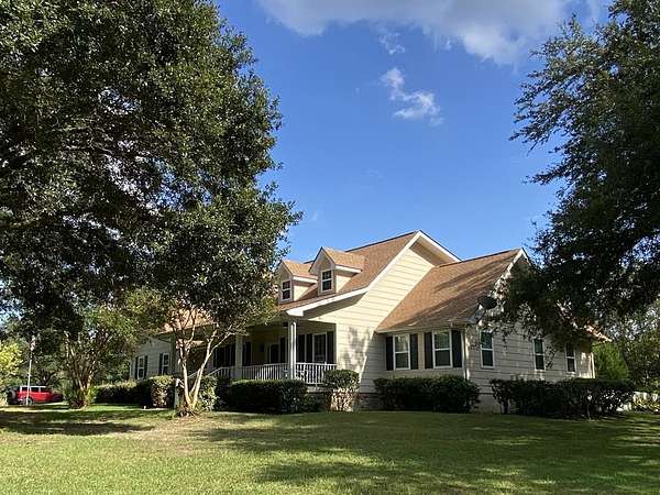 57.4 Acres of Land with Home for Sale in Carriere, Mississippi